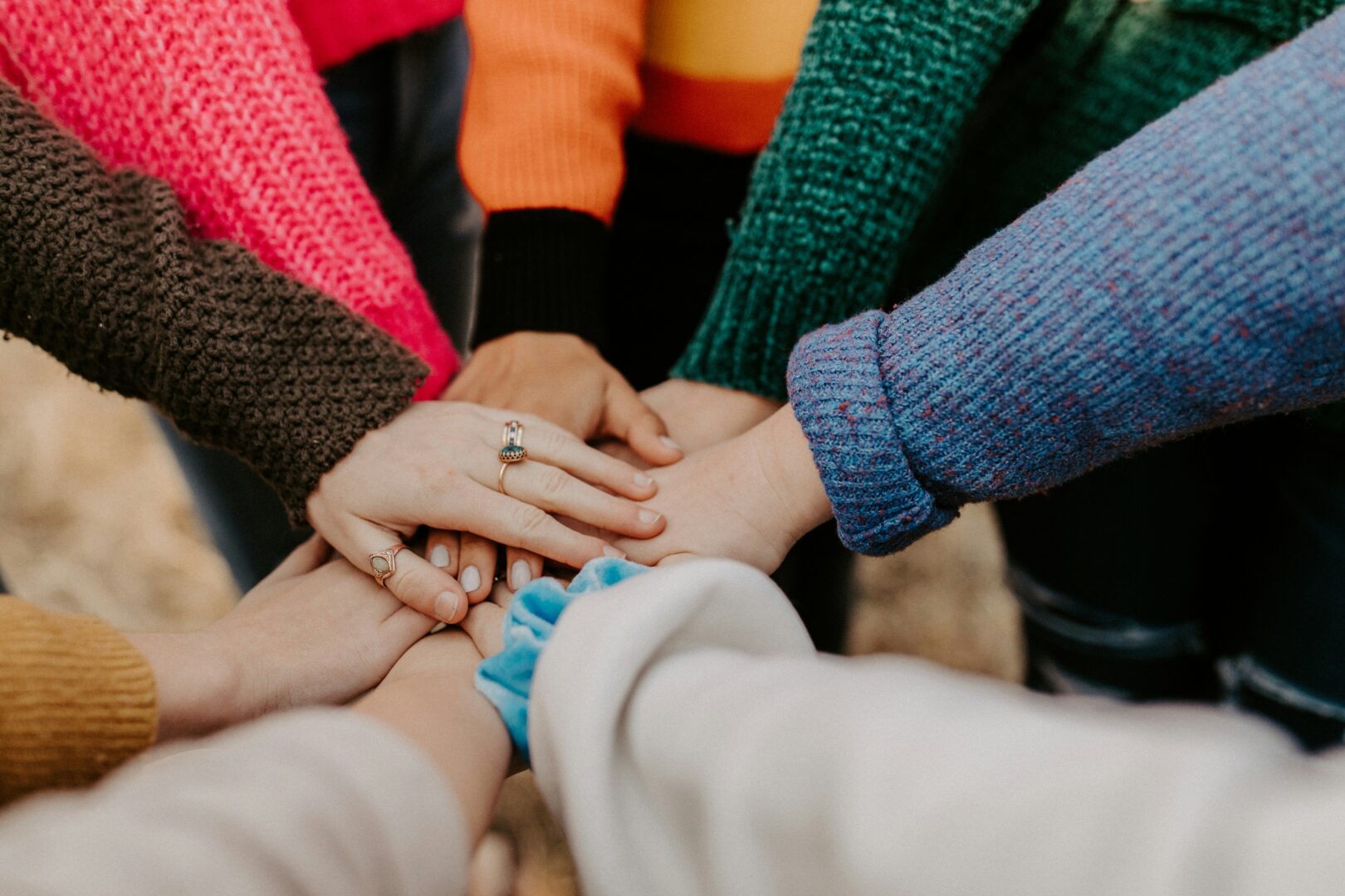 holding hands, substance abuse support, a group of people holding hands