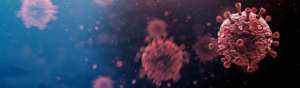 Red coronavirus particles floating on blue background