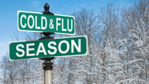 Cold & Flu Season street signs in snow