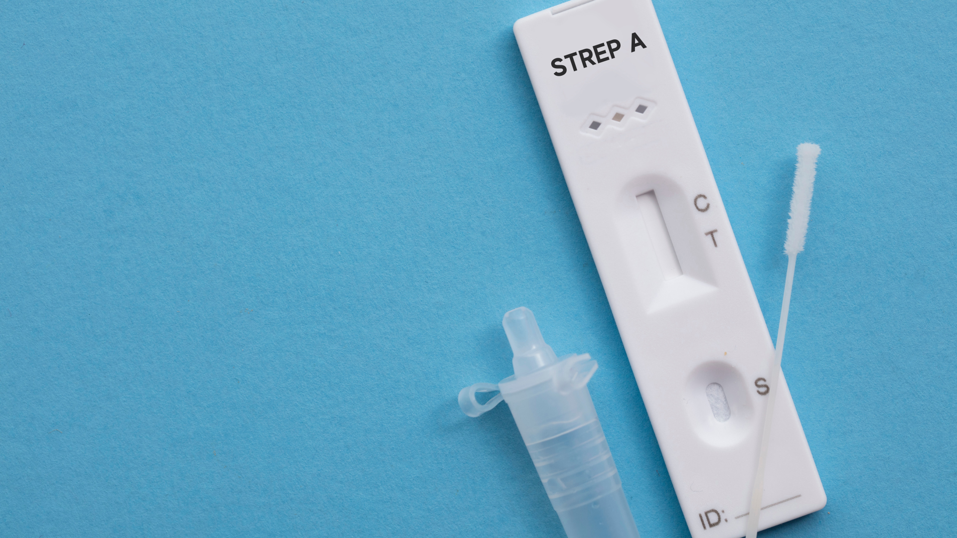 Rapid Strep A medical device with swab and solution on a blue background, used for quick detection of Streptococcus infections.